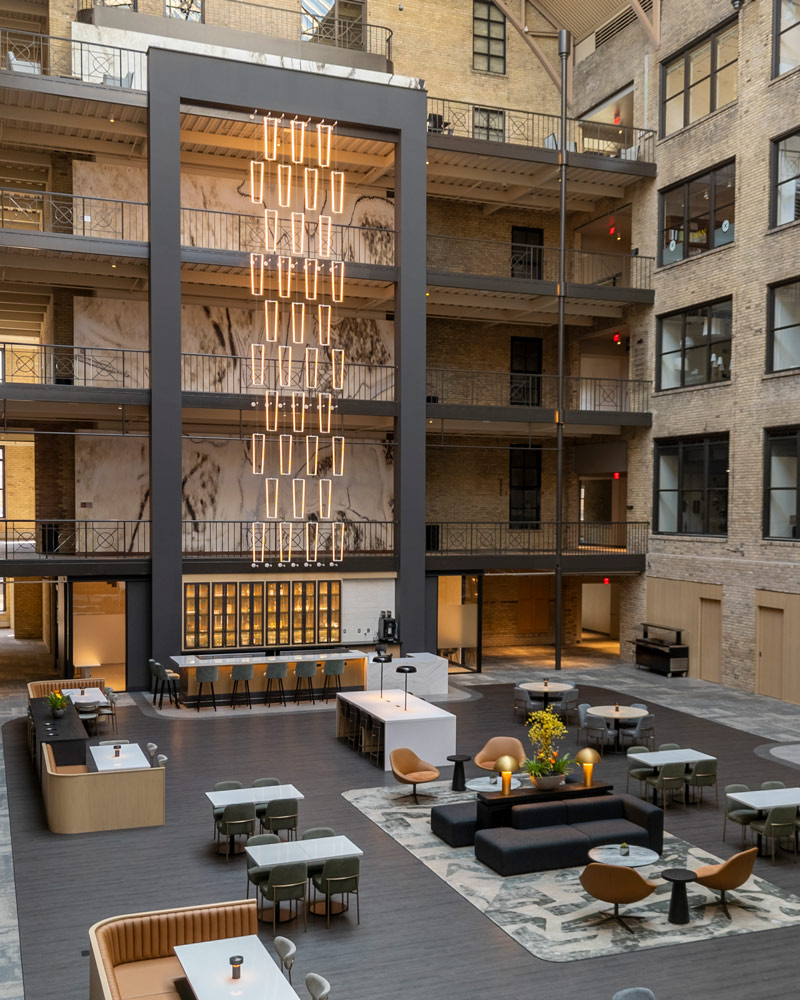 International Market Square's brick-lined atrium, chandelier, and seating area
